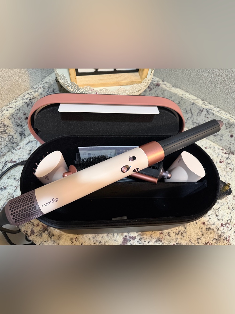 Dyson multi-styler in white and rose gold